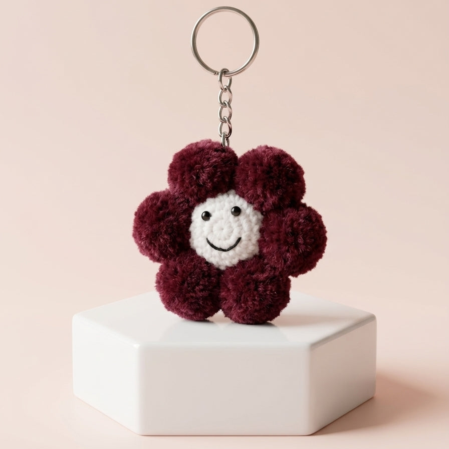 Vibrant crimson red handcrafted plush charm detailing its dense yarn layout and premium anti-rust metallic security clip.