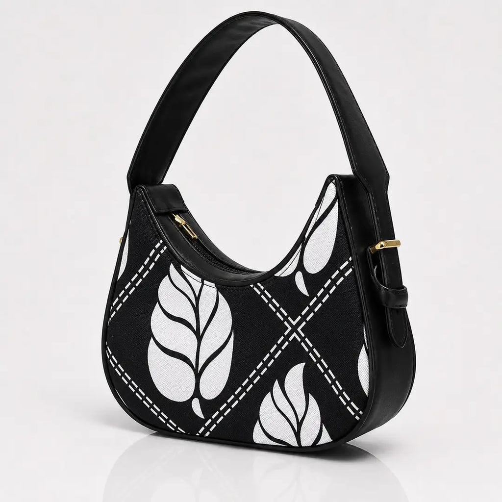 The sleek jet black variation of our floral canvas hobo piece packaged cleanly for a hand-crafted unique and trend in aesthetics look.