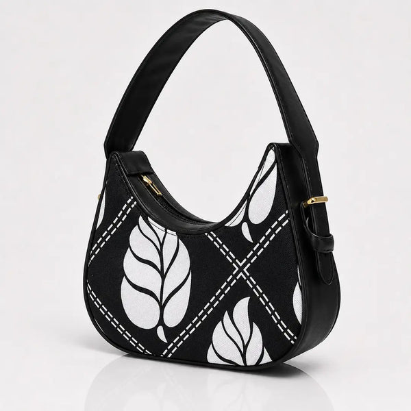 The sleek jet black variation of our floral canvas hobo piece packaged cleanly for a hand-crafted unique and trend in aesthetics look.