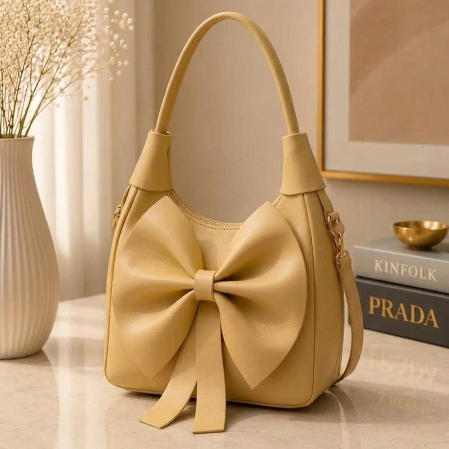 Warm mustard yellow leather artisanal creation displaying its durable top handle strap construction and clean edges.