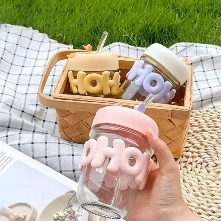 Aesthetic picnic setup of the Range Studio Bubble Glass Tumblers styled elegantly inside a hand-woven basket.