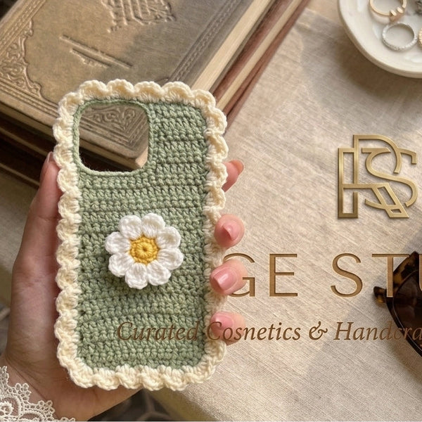 Hand-crafted woven phone case in pastel green detailing the cozy protective texture and secure edge-to-edge profile.