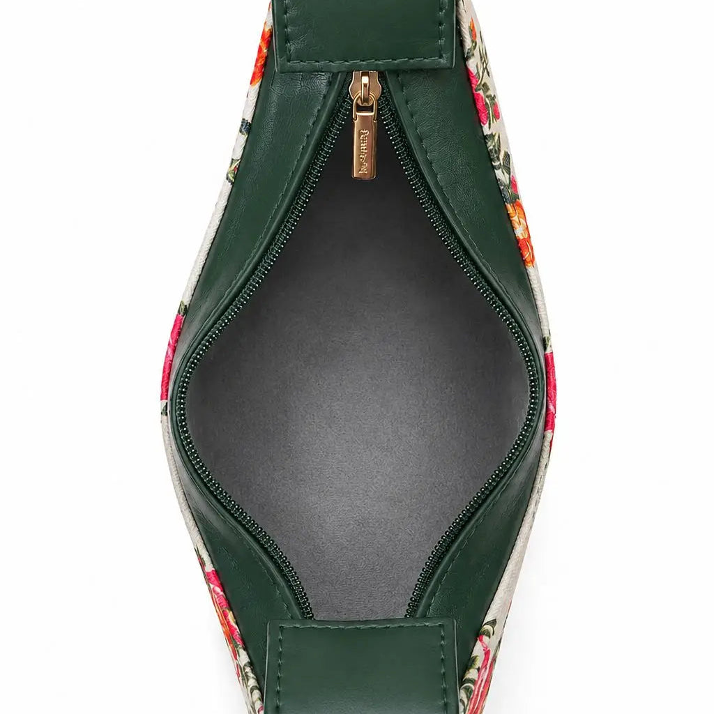 Detailed perspective of the robust top buckle enclosure designed for secure item storage on the canvas hobo creation.