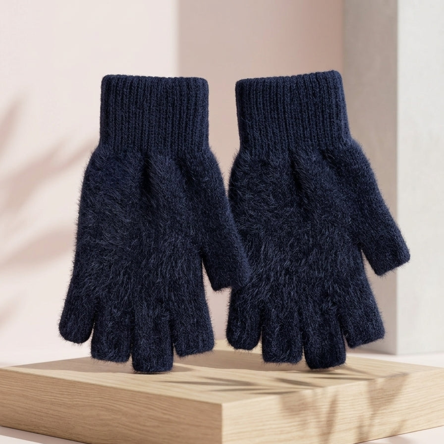 The Midnight Navy blue variant of the Range Studio structural fuzzy rabbit wool half-finger gloves presented on a light wooden display block