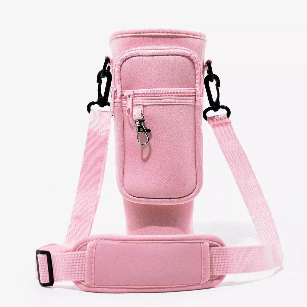 Front angle view of the Range Studio Blush Tea Pink insulated tumbler pouch highlighting the clean stitching and front metal spring-clip hook.