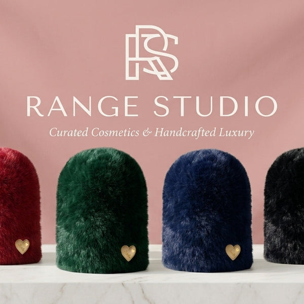 The full collection banner of the Range Studio Plush Rabbit Wool Beanies showcasing the Crimson Ruby, Emerald Velvet, Midnight Sapphire, and Onyx Black colorways under a white logo backdrop.